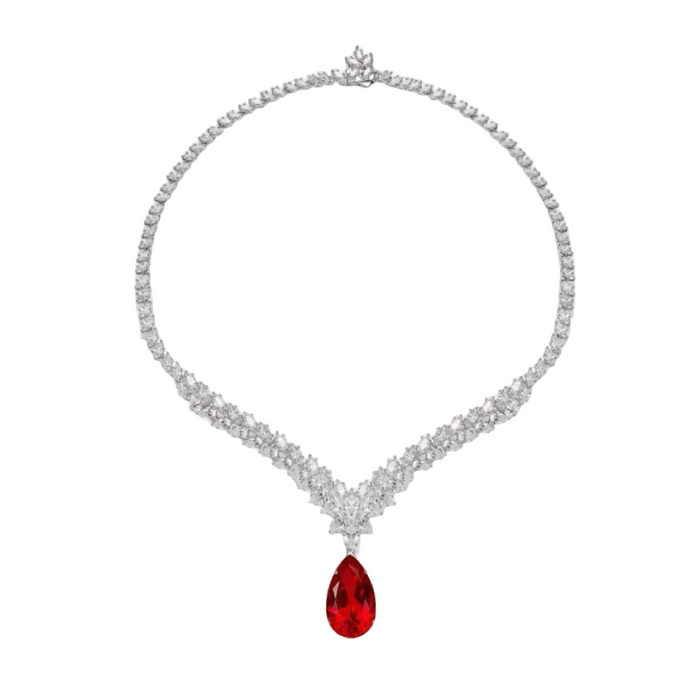 The Gem Vivi Caroline Ruby Teardrop Statement Necklace features a large lab-created ruby pendant set in 18k white gold, shown on a white background.