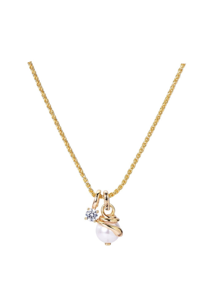 The Serpentine Charm Necklace by Gem Vivi features an 18K yellow gold chain with a pendant showcasing a shell pearl encircled by gold and accented with a small clear gemstone.