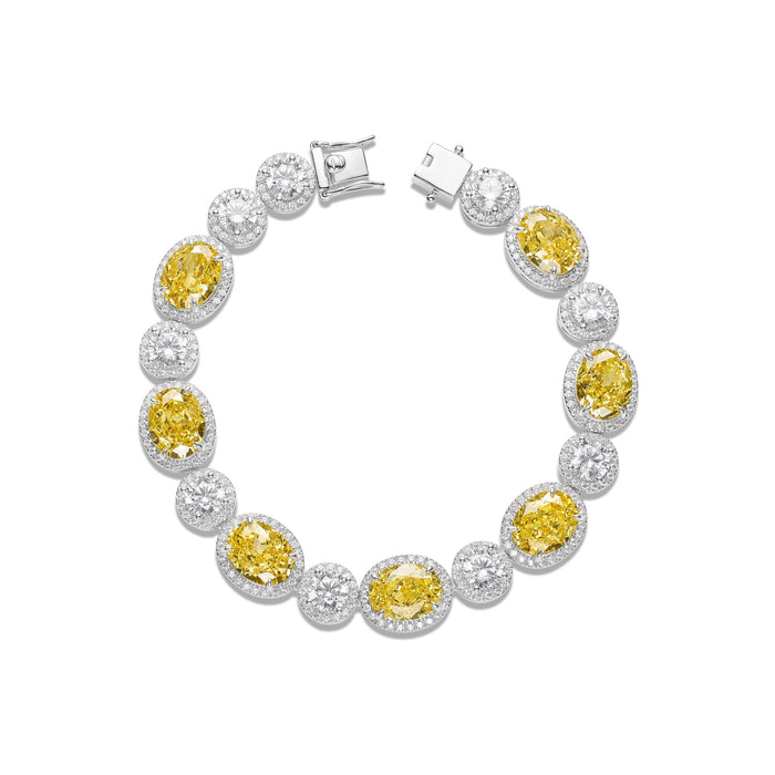 The Gem Vivi Canary Yellow Circle Bracelet features alternating white and yellow vivi gems set in 18k gold-plated sterling silver with a secure clasp.