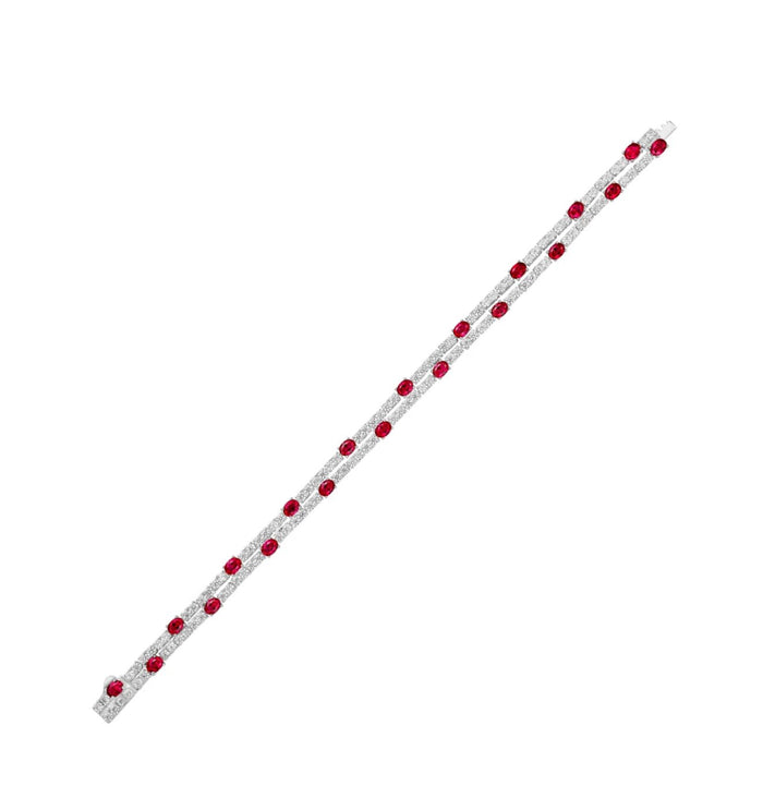 The Cora Ruby Dot Double Chain Bracelet by Gem Vivi features lab-created red gemstones and small clear stones in a linear design, set in elegant 18k white gold.