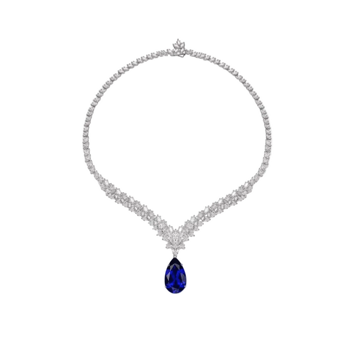 The Gem Vivi Blue Sapphire Teardrop Necklace features a lab-created sapphire pendant set in elegant 18k white gold.