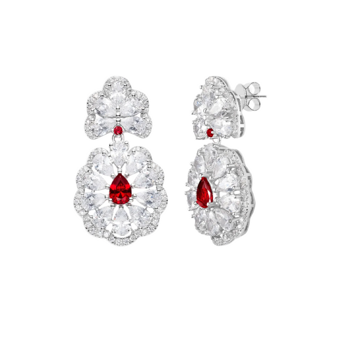 The Carissa Ruby Drop Earrings by Gem Vivi feature large clear gemstones in a floral pattern, 18k white gold settings, a central pear-cut lab-created ruby, and a round red stone above.