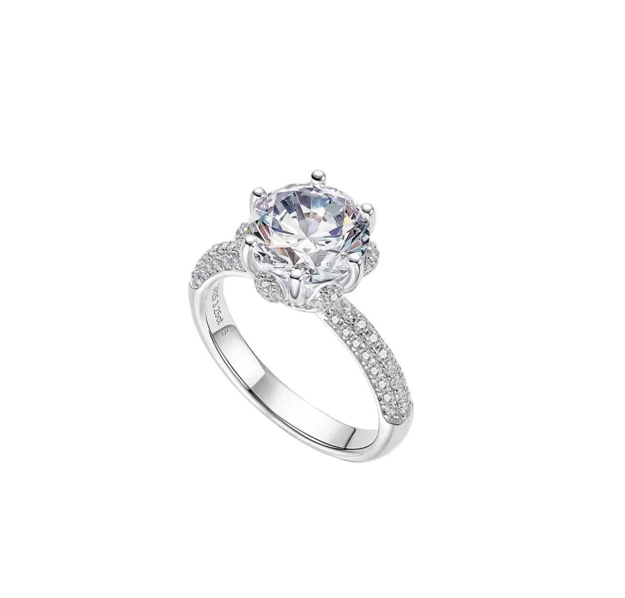 The Celestia Bloom Solitaire Ring by Gem Vivi showcases a large round-cut center stone and delicate pavé accents on an 18k white gold band, beautifully displayed on a white background.