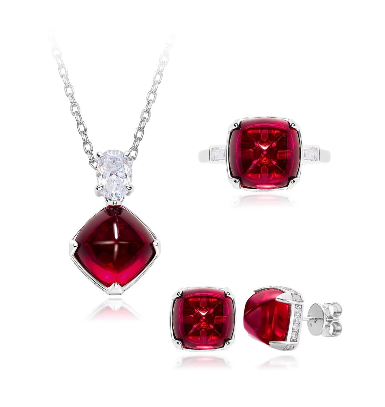 The Gem Vivi Radiance Sugar-loaf Ring, with a striking red stone, is part of a jewelry set including a sterling silver necklace with red pendant and matching square red stone stud earrings.