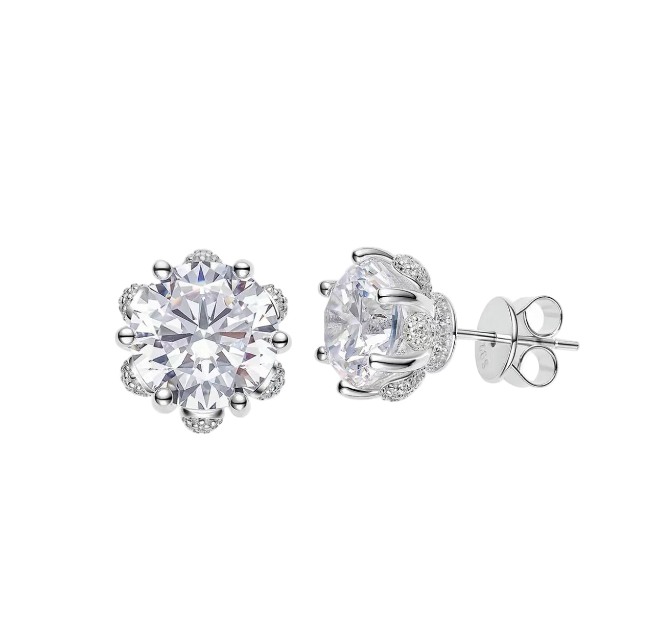 The Celestia Bloom Stud Earrings by Gem Vivi feature large central clear stones encircled by smaller stones, set in 18k White Gold with butterfly backings.