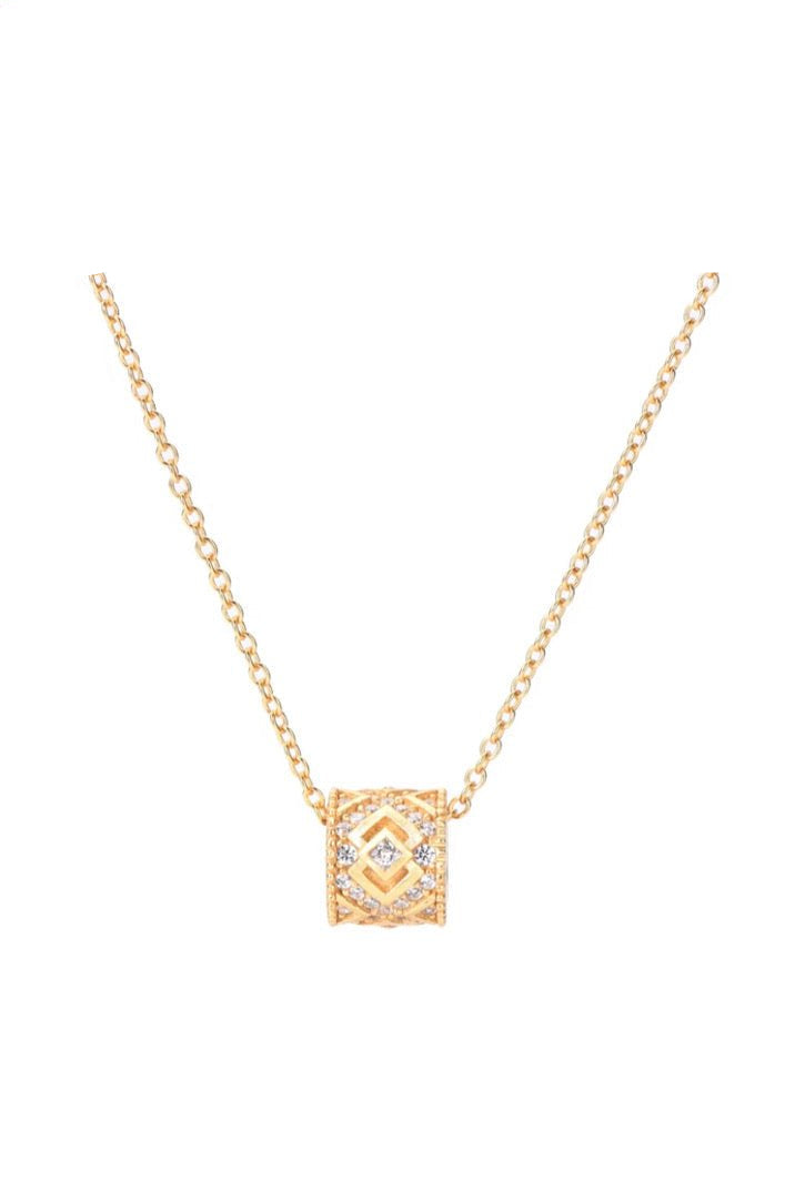 The Lattice Barrel Necklace by Gem Vivi features a fine chain and a geometric barrel-shaped pendant with sparkling cubic zirconia, finished in 18K yellow gold and shown against a white background.