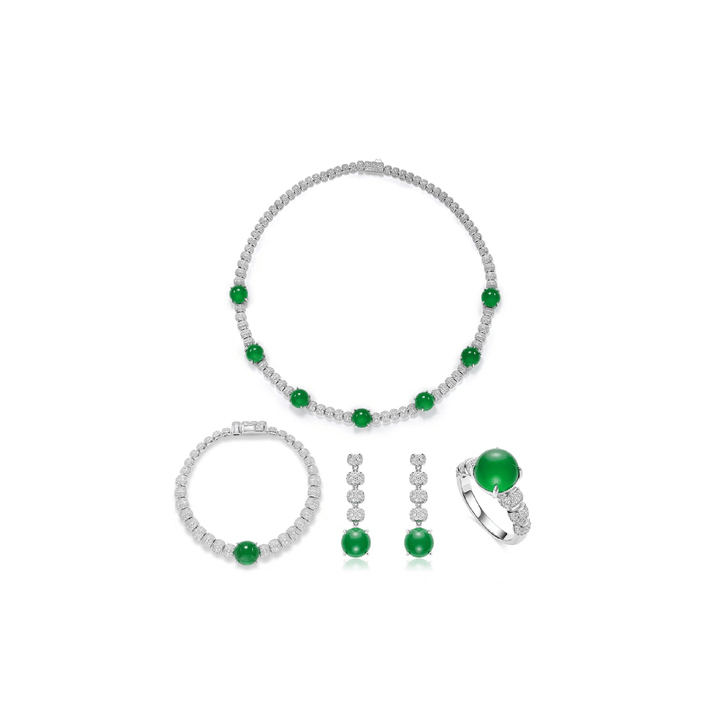 The jewelry set features a necklace, bracelet, ring, and Gem Vivi Chalcedony Cabochon Drop Earrings in 18k white gold with green gemstones and pavé diamond beads on a white background.