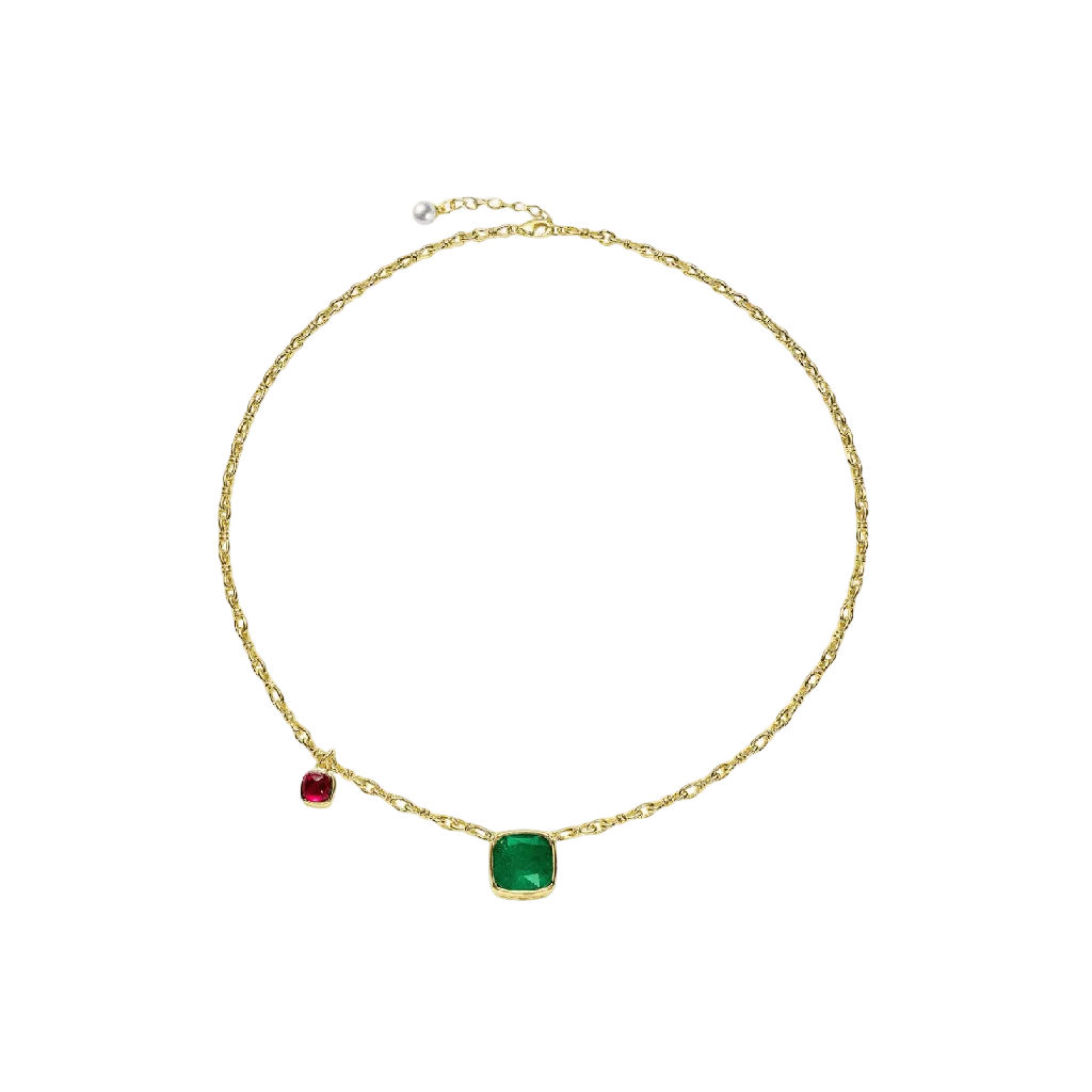 The Chloe Duo Charm Necklace by Gem Vivi features an 18k yellow gold chain with a large lab-created emerald square pendant and a smaller red round charm, both set in gold.