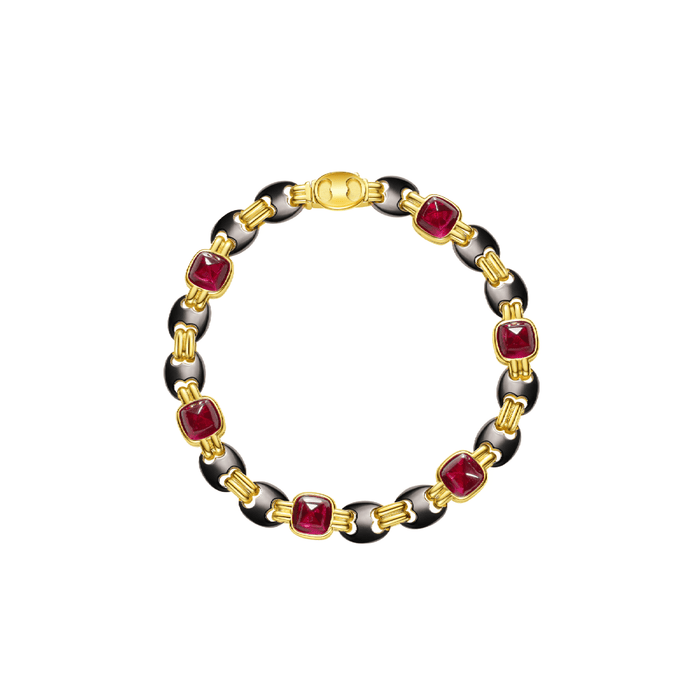 The Charlotte Gilded Ruby Link Bracelet by Gem Vivi is an Art Deco piece in 18k gold sterling silver, featuring black links and six square lab-created rubies evenly spaced around the band, shown on a white background.