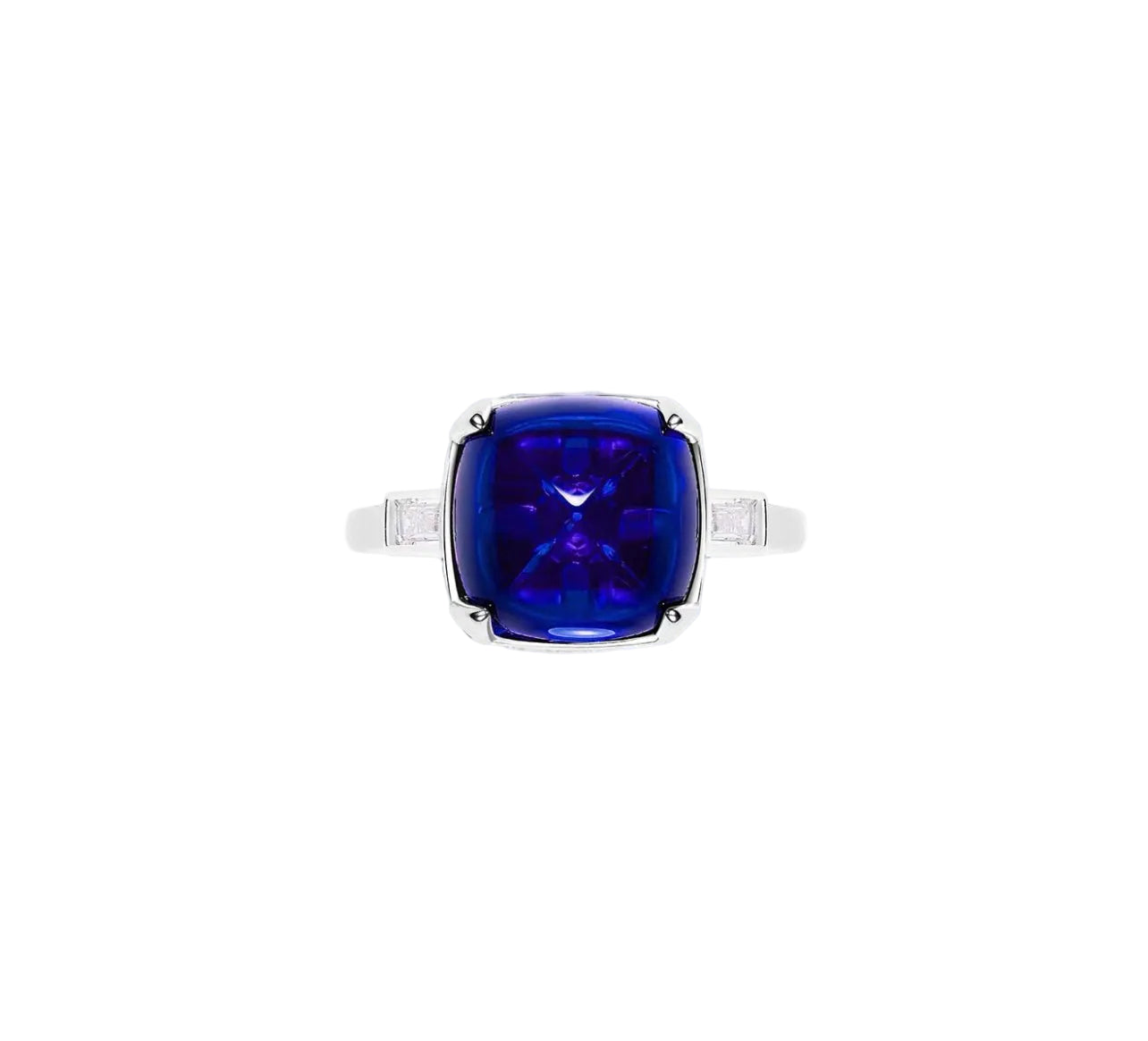 The Gem Vivi Blue Midnight Sugar-loaf Ring showcases a square deep blue center stone, accented by two small rectangular cubic zirconia on each side.