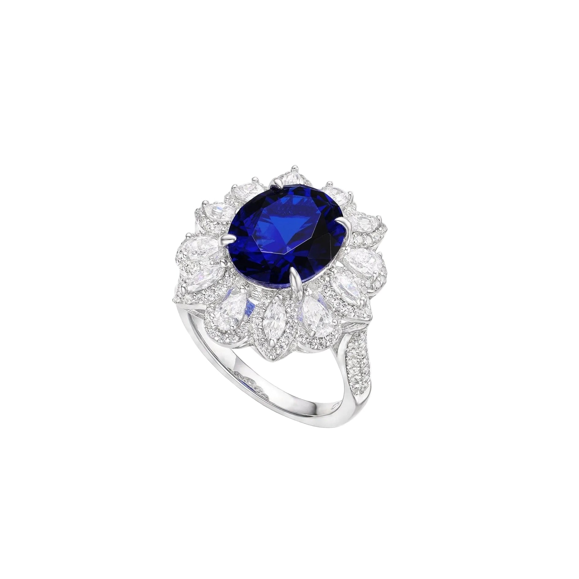 The Midnight Glow Halo Ring by Gem Vivi showcases a large oval sapphire at its center, encircled by round and marquise-cut clear stones, all set in elegant 18k white gold.