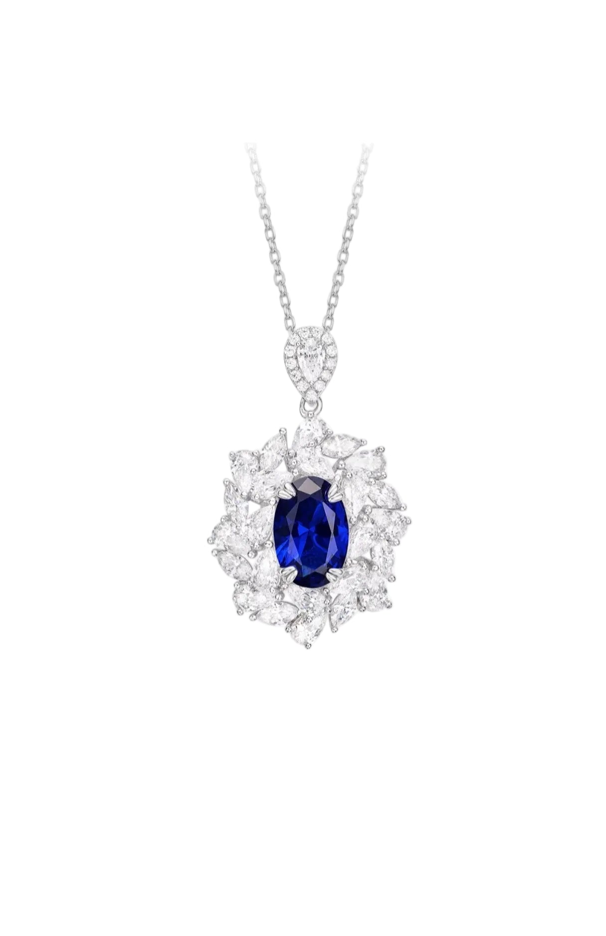The Gem Vivi Blue Midnight Royale Marquise Halo Pendant is a silver necklace with a large oval lab-created sapphire, accented by clear teardrop and marquise-cut stones in a stunning halo.