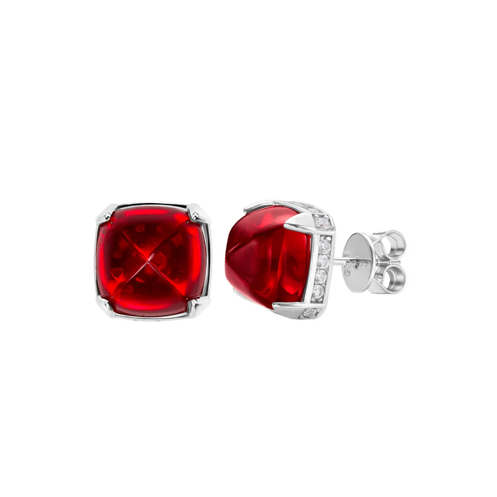 The Radiance Sugar-Loaf Earrings by Gem Vivi are sterling silver studs with square red gemstones, accented by small clear stones set along one edge of each earring.