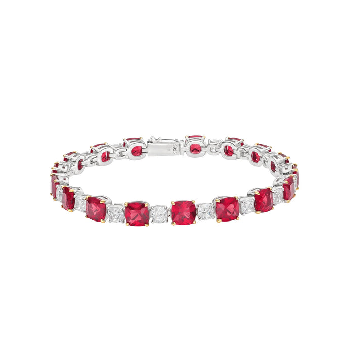 The Calla Glow Ruby Tennis Bracelet by Gem Vivi features lab-created rubies and round white gemstones set in 18k white gold with a secure clasp closure.