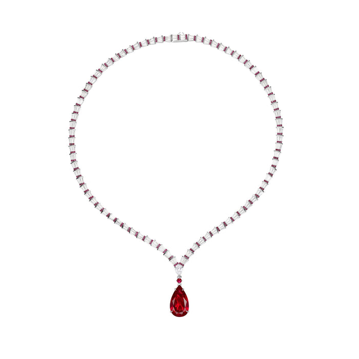 The Gem Vivi Baguette And Teardrop Ruby Statement Necklace showcases a striking pear-cut ruby pendant in 18k white gold, blending elegance and timeless beauty.