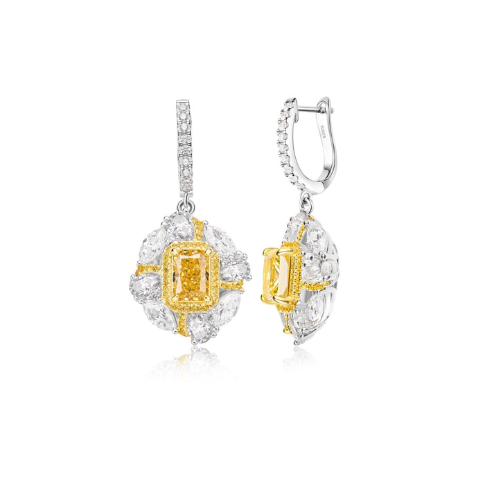 The Gem Vivi Canary Yellow Square Stone Dangle Earrings feature emerald-cut centers, white stone halos, and extra stones on 18k white gold hooks.